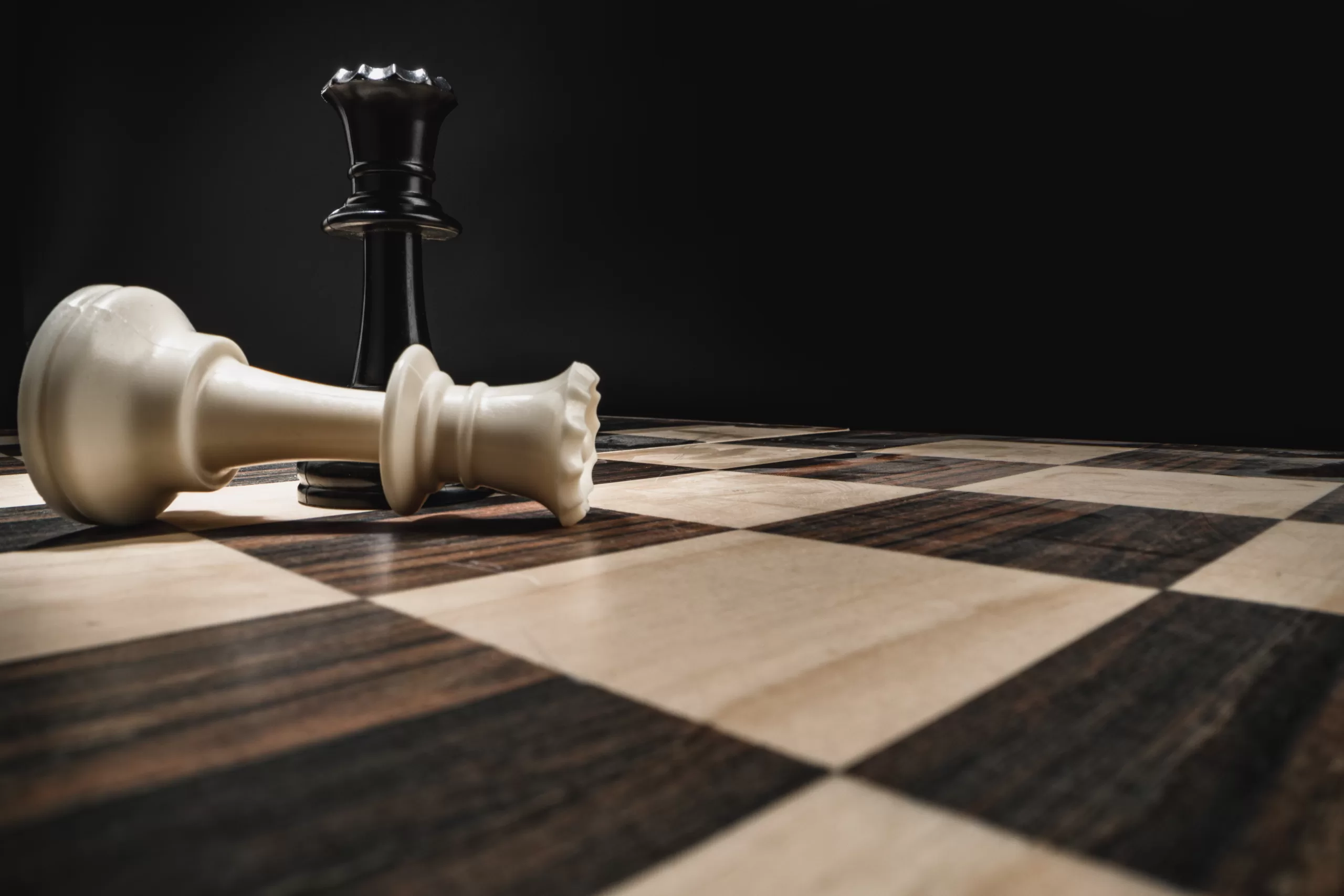 chess board with figures on dark background